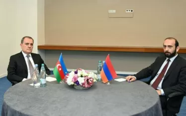 աս