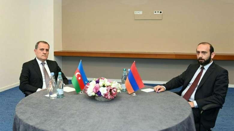 աս